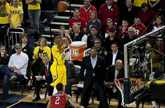 Aubrey Dawkins (24) and Rutgers Head Coach Eddie Jordan