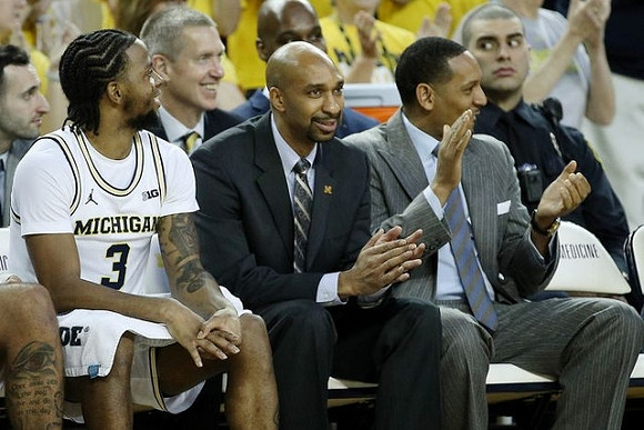 Zavier Simpson (3), Saddi Washington, and Howard Eisley