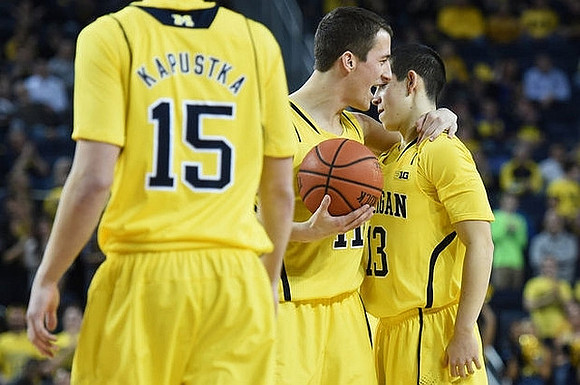 Ryan Kapustka, Andrew Dakich (11), and Jon Rubenstein