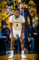 Zavier Simpson (3) and Juwan Howard