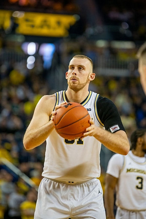 Austin Davis (51) and Zavier Simpson (3)