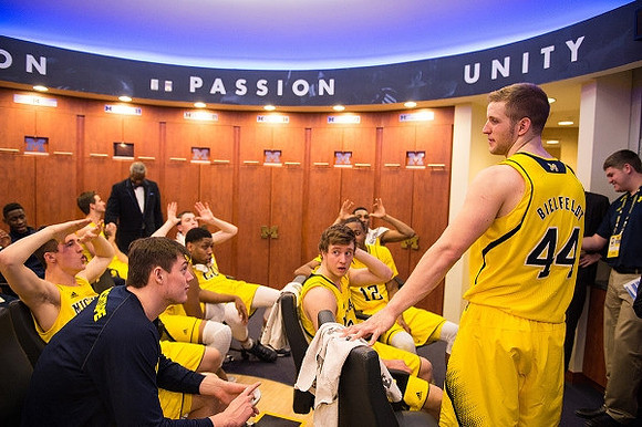 Max Bielfeldt (44) and Michigan Team