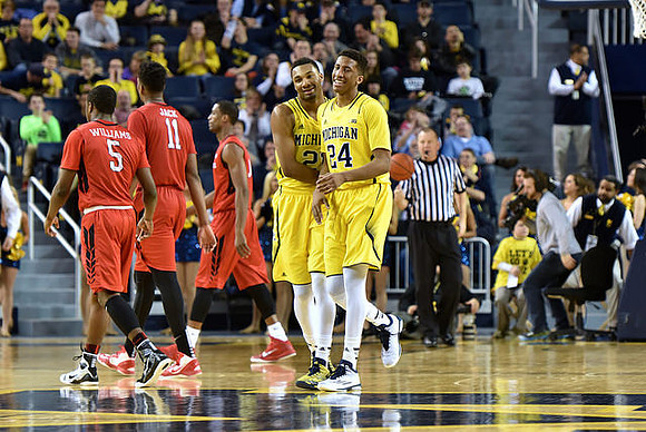 Zak Irvin (21) and Aubrey Dawkins (24)
