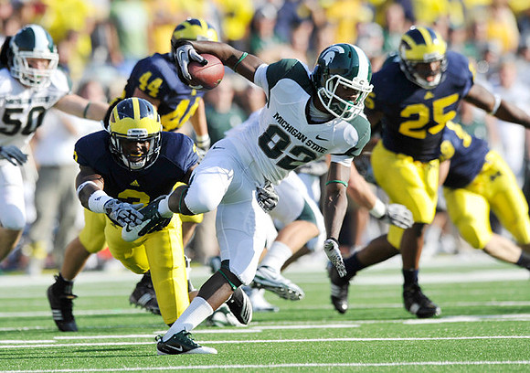 Marvin Robinson (3), Mark Moundros (44), and Kenny Demens (25)