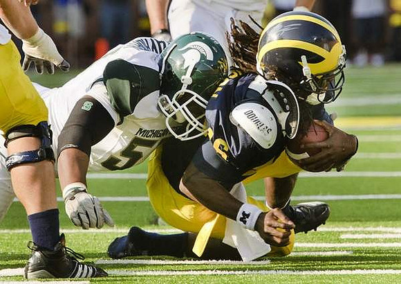 Denard Robinson (16)