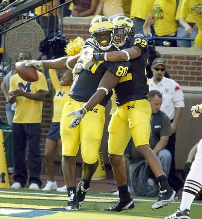 Martell Webb (80) and Darryl Stonum (22)