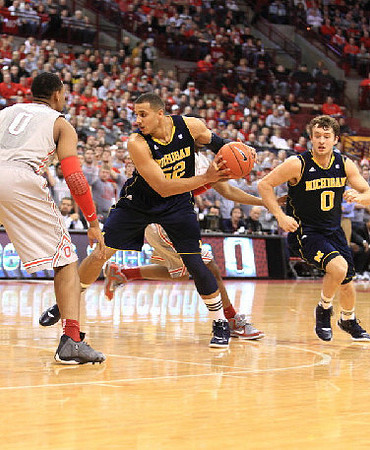 Jordan Morgan (52) and Zack Novak (0)