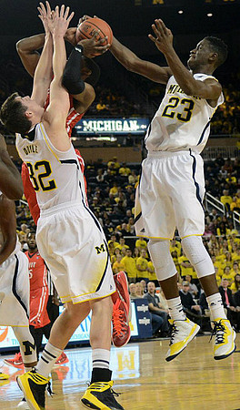Ricky Doyle (32) and Caris LeVert (23)
