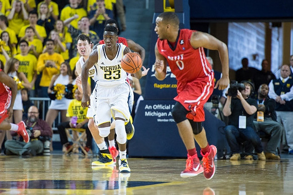 Ricky Doyle (32) and Caris LeVert (23)