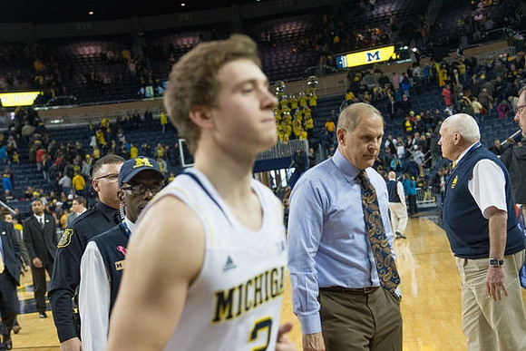 Spike Albrecht (2) and John Beilein