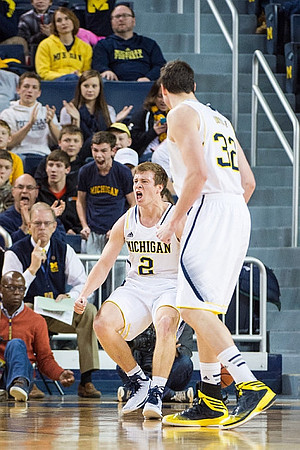 Spike Albrecht (2) and Ricky Doyle (32)
