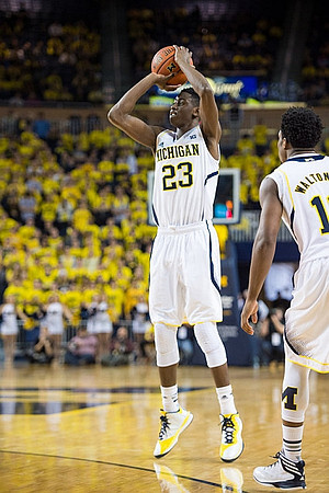 Caris LeVert (23) and Derrick Walton Jr. (10)