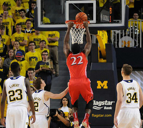 Caris LeVert (23), Spike Albrecht (2), and Mark Donnal (34)