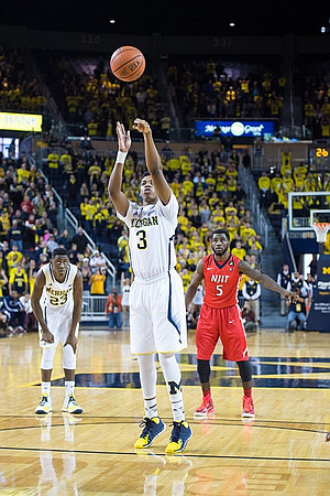 Caris LeVert (23) and Kameron Chatman (3)