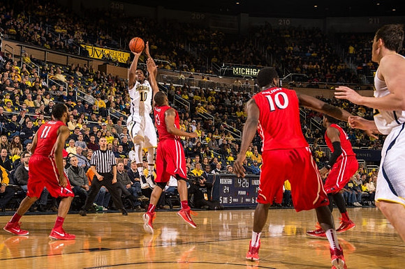 Derrick Walton Jr. (10) and Ricky Doyle (32)
