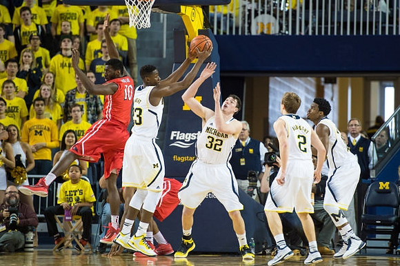 Caris LeVert (23), Ricky Doyle (32), Spike Albrecht (2), and Derrick Walton Jr. (10)