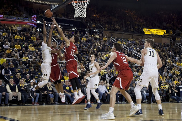 Muhammad-Ali Abdur-Rahkman (12), Duncan Robinson (22), and Moritz Wagner (13)
