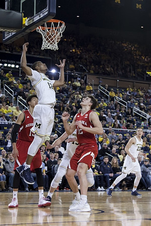 Muhammad-Ali Abdur-Rahkman (12), Moritz Wagner (13), and Duncan Robinson (22)