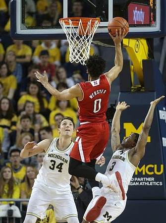 Mark Donnal (34) and Xavier Simpson (3)