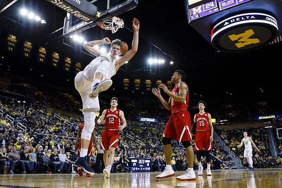 Moritz Wagner (13) and Duncan Robinson (22)