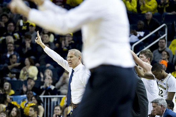 John Beilein, Moritz Wagner (13), and Muhammad-Ali Abdur-Rahkman (12)