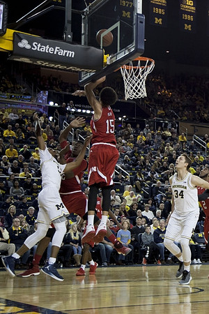 Muhammad-Ali Abdur-Rahkman (12) and Mark Donnal (34)
