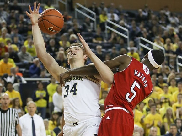 Mark Donnal (34) and John Beilein