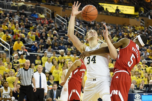 Mark Donnal (34) and John Beilein