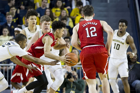 Muhammad-Ali Abdur-Rahkman (12), D.J. Wilson (5), Moritz Wagner (13), and Derrick Walton Jr. (10)