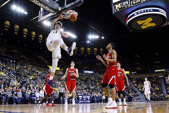 Moritz Wagner (13) and Duncan Robinson (22)