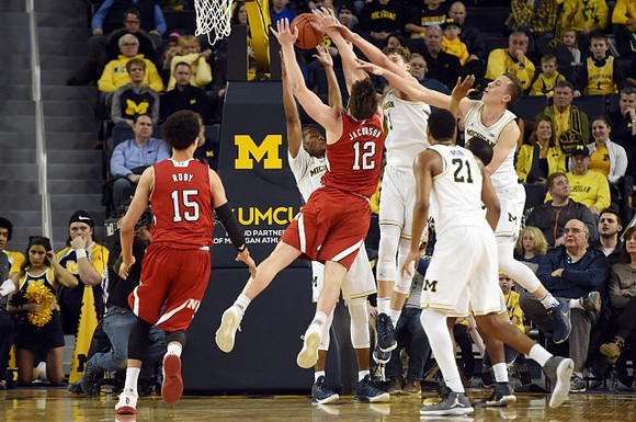 Moritz Wagner (13), Zak Irvin (21), and Duncan Robinson (22)