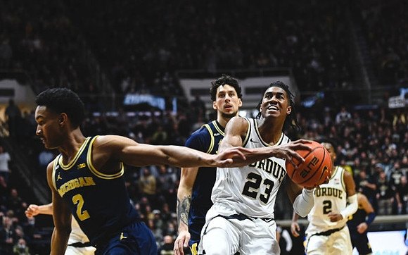 Kobe Bufkin (2) and Brandon Johns Jr. (23)