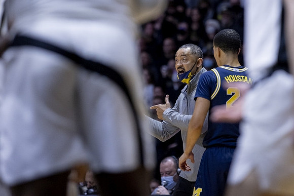 Juwan Howard and Caleb Houstan (22)