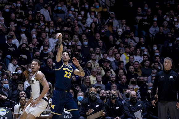 Brandon Johns Jr. (23) and Purdue Head Coach Matt Painter