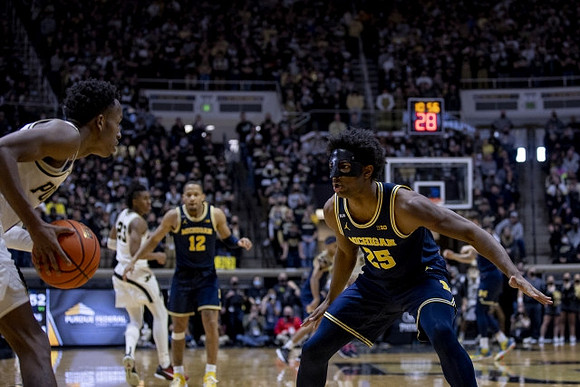 DeVante' Jones (12) and Jace Howard (25)