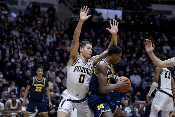 Moussa Diabate (14) and Caleb Houstan (22)