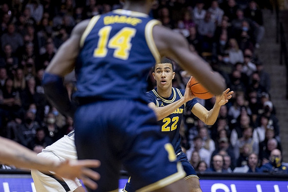 Caleb Houstan (22) and Moussa Diabate (14)