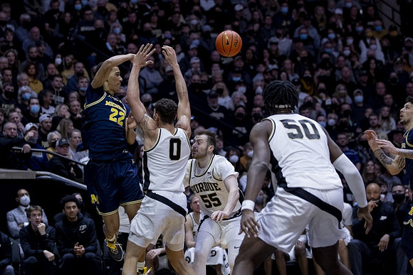Caleb Houstan (22) and Brandon Johns Jr. (23)