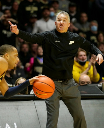 DeVante' Jones (12) and Purdue Head Coach Matt Painter