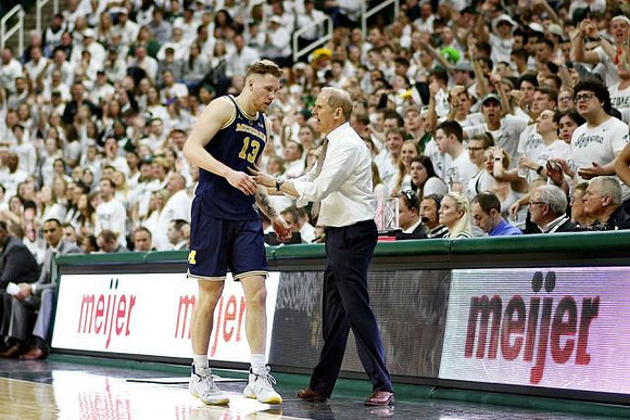Ignas Brazdeikis (13) and John Beilein
