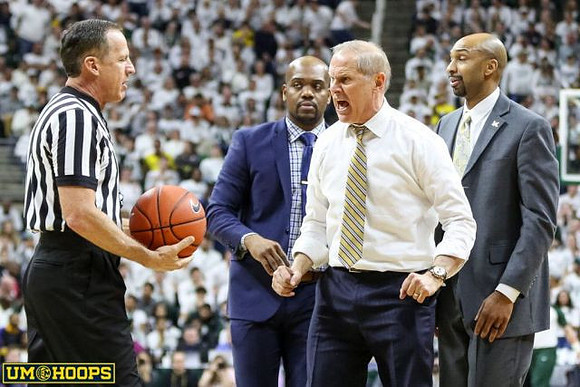 Deandre Haynes, John Beilein, and Saddi Washington