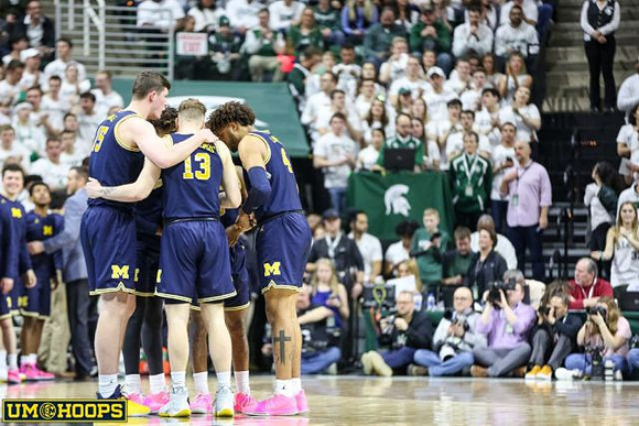Jon Teske (15), Ignas Brazdeikis (13), and Isaiah Livers (4)