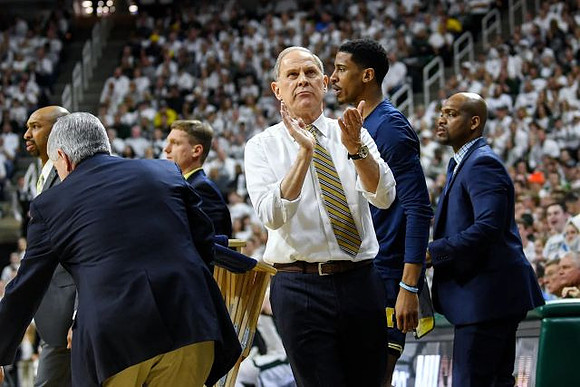Saddi Washington, Luke Yaklich, John Beilein, Charles Matthews (1), and Deandre Haynes