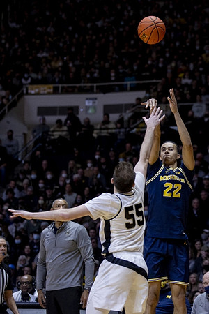 Caleb Houstan (22) and Juwan Howard