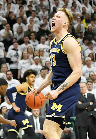 Ignas Brazdeikis (13) and Jordan Poole (2)