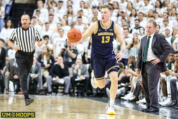 Ignas Brazdeikis (13) and Michigan State Head Coach Tom Izzo
