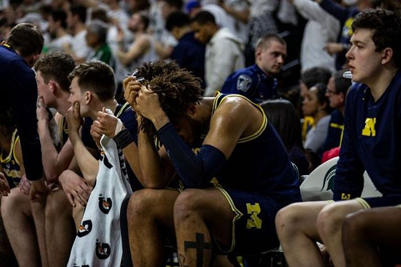 Jon Teske (15), Colin Castleton (11), Isaiah Livers (4), and C.J. Baird (24)