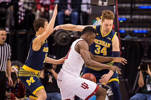 Andrew Dakich (11) and Mark Donnal (34)