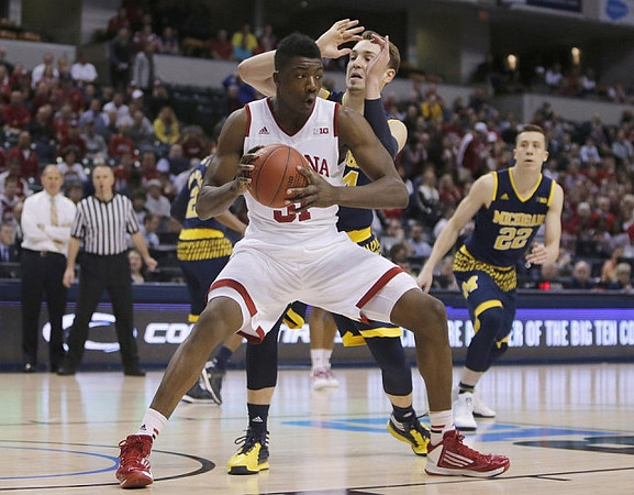 Mark Donnal (34) and Duncan Robinson (22)