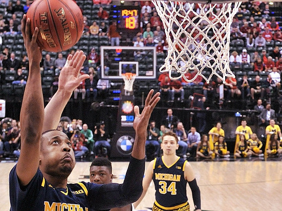 Muhammad-Ali Abdur-Rahkman (12) and Mark Donnal (34)